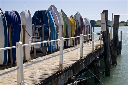 Yacht tenders stacked on jetty