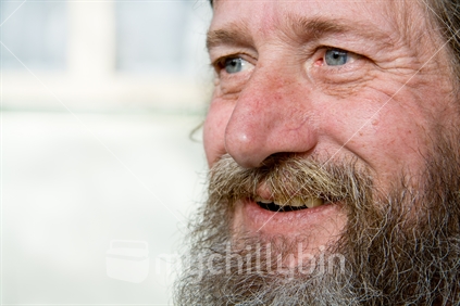 Close-up of man's face with a happy look