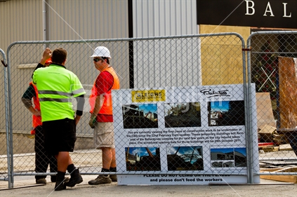 The first piece of construction work in Christchurch's Central Business District is the famous department store Ballantynes. This image taken the day before Opening (29th October). Workers by the sign explaining the construction site.