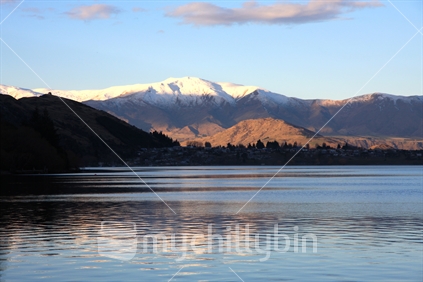 Sun setting on The Remarkables range on Lake Whakatipu in Queenstown