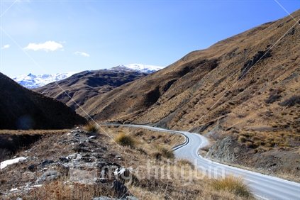 Winding road to Wanaka, through the Crown Range, South Island, New Zealand.