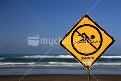 No swimming warning sign on west coast beach