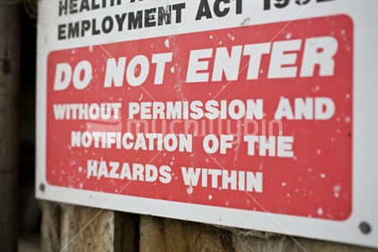 A warning sign not to enter a tool shed