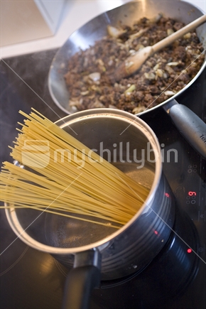 Making spaghetti bolognese 