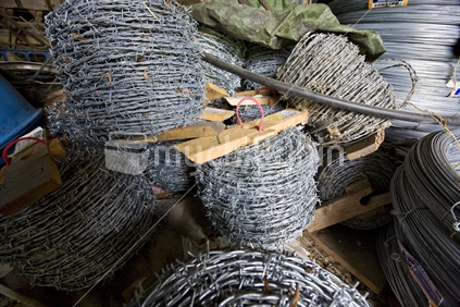 Bales and roles of barbed wire