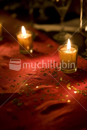candles on red cloth