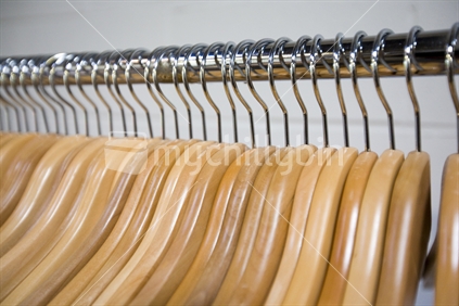 Empty wooden coat hangers