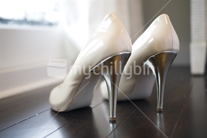 A pair of sexy white heels with silver stiletto's