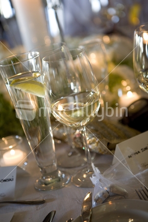Selection of drinks at a dinner table - wine and water
