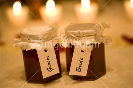 Bride and groom honey pot table settings