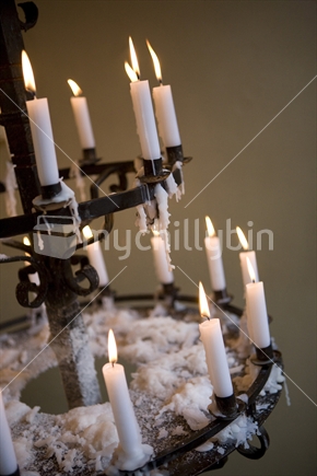 Candelabra of white burning candles