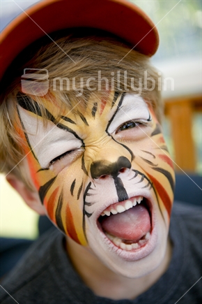 Young boy with painted face