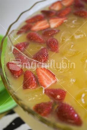 Bowl of punch with strawberries
