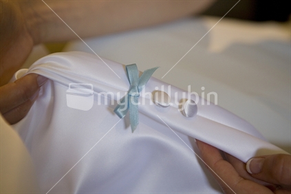 Something blue for your wedding - blue ribbon inside a wedding dress