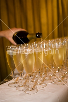 Pouring glasses of champagne