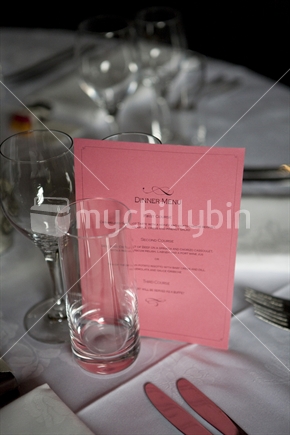 Pink menu at a table setting