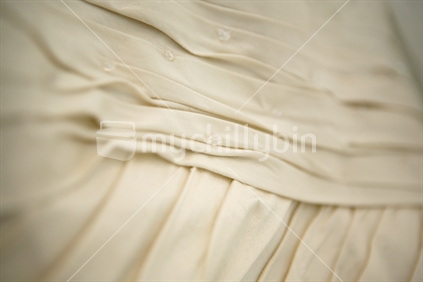 Detail of silk wedding dress
