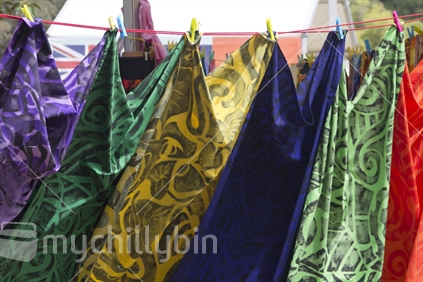 Colourful sarongs hanging at the Pasifika festival. 