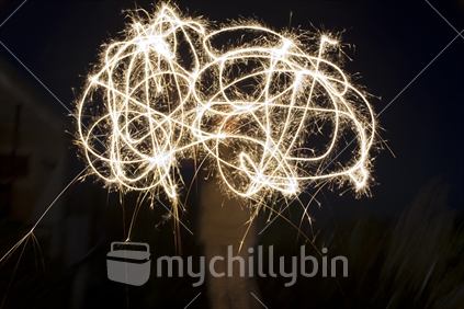 Creating patterns with sparklers on Guy Fawkes night (artistic treatment)