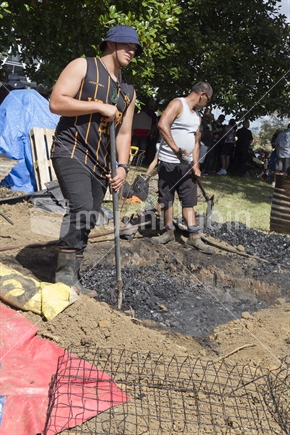 Digging out the hangi pit. 