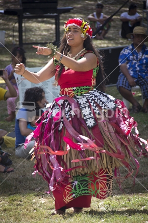 Tuvaluan girl dancing in traditional dress at Pasifika Festival