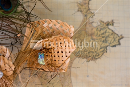 Flax woven flower and New Zealand map