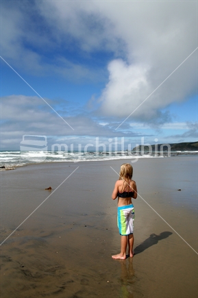 Young swimmer on the beach