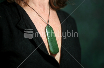 Woman wearing Hei-Tiki Pendant