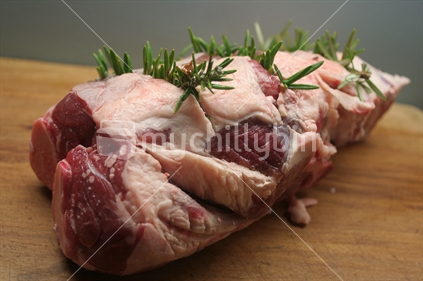 Leg of New Zealand lamb, ready for roasting with garlic and rosemary