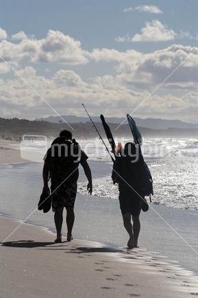 Fishermen walking home, Pakiri, New Zealand