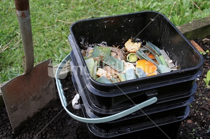 Food scraps fermenting in compost bucket, household system