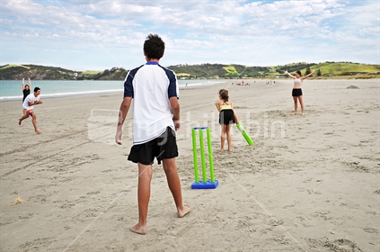 Beach Cricket - caught out