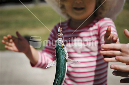 Kids get excited about catching a little fish