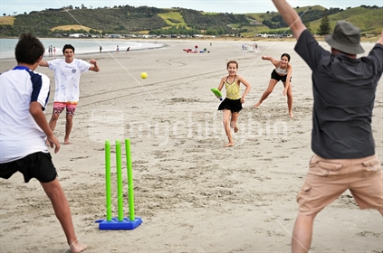 Family Beach Cricket - Run out (selective focus and some motion blur)