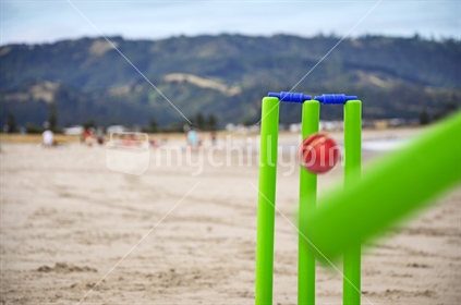 Beach Cricket - Bowled (Selective focus and motion blur) 