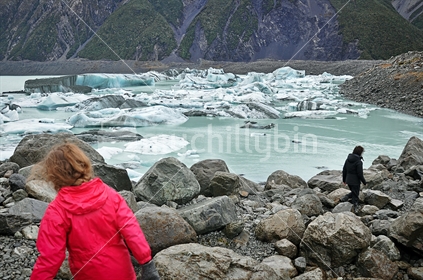 Tourists at Tasman Glacier lake