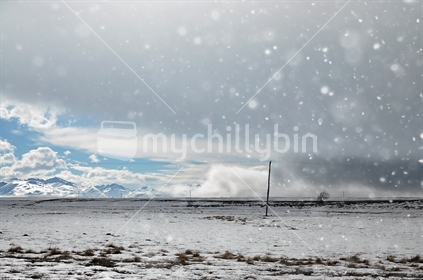 Arrival of a snow storm on the Mackenzie Basin