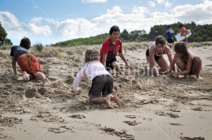 Kids building sandcastles