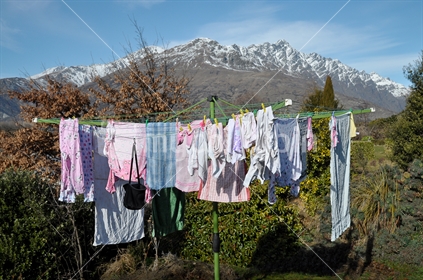 Clothes Drying in front of Snow Capped Mountain