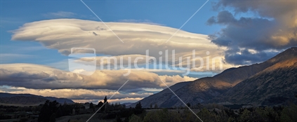 Panorama of dramatic Nor'wester clouds over The Remarkables (low light image)