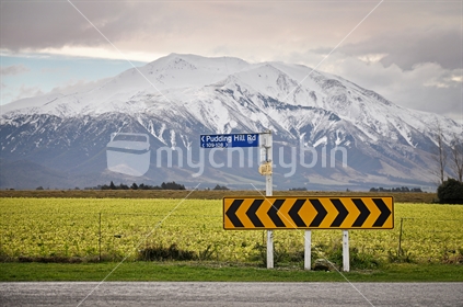 Mt Hutt and Pudding Hill Road Sign at T intersection. 