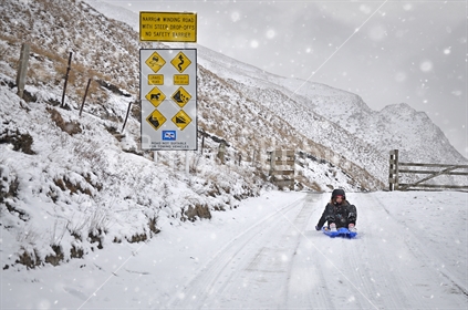 Tobogganing on Skippers Canyon road
