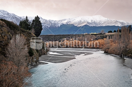 View down the Shotover River toward the Coronet Peak ski field - just before sunset, Queenstown, South Island, New Zealand