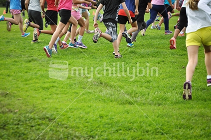 Start of the school cross country event (selective focus and motion blur)