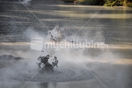 Mud pool eruptions (selective focus and motion blur) 