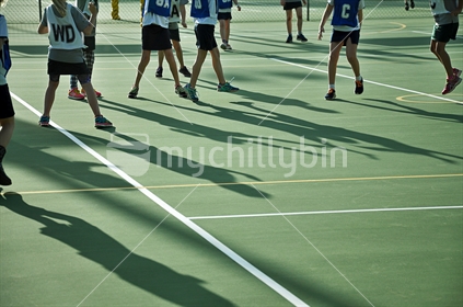 Girls on a netball court 