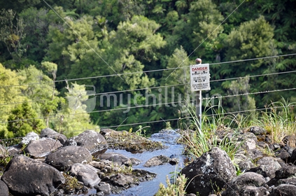 Danger! steep cliff sign (selective focus)