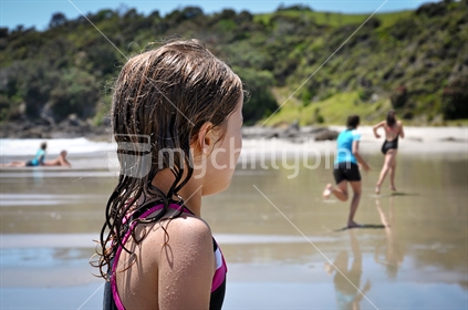Kids play at the beach (selective focus)