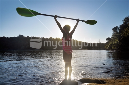 Girl gets ready to kayak
