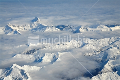 Mount Aspiring peeps through the clouds (selective focus)
